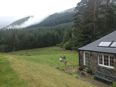 Mountains, forest, and the back of the cottage we stayed in near Fort William, Scotland.