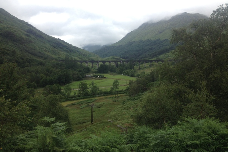Mountains intersecting behind the Glenfinnan Viaduct, or more commonly known as the Hogwarts Express bridge.